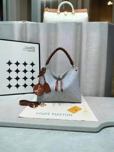 louis vuitton,vuitton,lv,luxottica,luxury accessories,smythson,lenscrafters,gift bag,women's accessories,book glasses,purse,wallet,envelopes,accessories,lvmh,lufthansa,stone day bag,corporate jet,nord