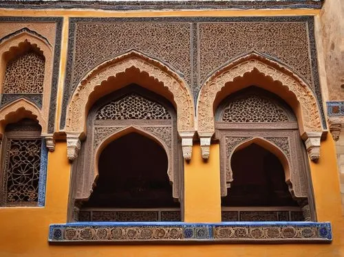 Granada Spain architecture, Alhambra palace, Moorish style, intricate stone carvings, ornate arches, Islamic geometric patterns, vibrant tile work, grand courtyard, fountain, serene atmosphere, warm s