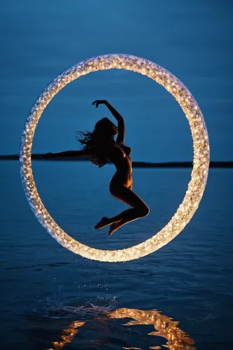 hoop (rhythmic gymnastics),circus aerial hoop,aerial hoop,hula hoop,rope (rhythmic gymnastics),ball (rhythmic gymnastics),lightpainting,gymnastic rings,inflatable ring,light painting,circle shape frame,epicycles,semi circle arch,rhythmic gymnastics,fire dancer,cartwheel,circular ring,circular,light art,ring of fire,Photography,Documentary Photography,Documentary Photography 04