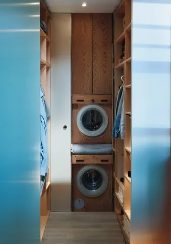 an elegant washer and dryer are in a wood - paneled closet,digital bi-amp powered loudspeaker,storage cabinet,loudspeakers,stereo system,audio speakers,electrohome,Photography,General,Realistic