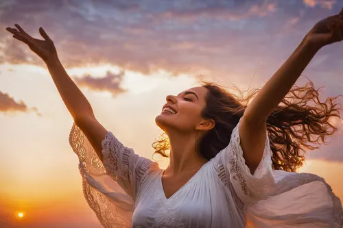 Enjoyment - free happy woman enjoying sunset. Beautiful woman in white dress embracing the golden sunshine glow of sunset with arms outspread and face raised in sky enjoying peace, serenity in nature,