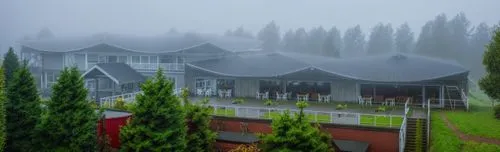 a big building surrounded by greenery and trees,gulmarg,kupwara,murree,kalimpong,kulgam,binsar,Photography,General,Realistic