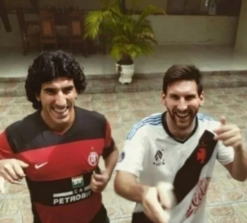 Dom Armando  Diego Maradona, hair Style word Cup 86,two men in uniforms, one holding a bat,itihad,aboutrika,krkic,gomaa,flamengo,bahrainis