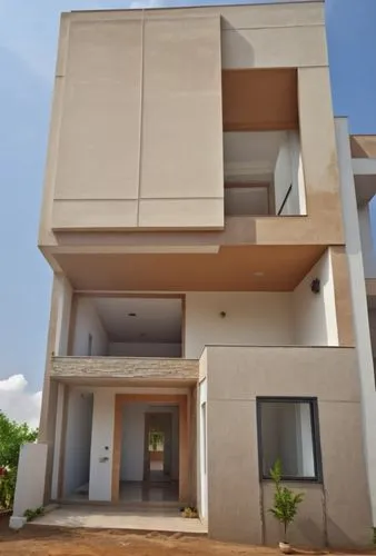 Glasses on raiiing  and lord ganesh texture on big wall with plants ,cubic house,amrapali,cube house,anantapur,gandhinagar,janmabhoomi,stucco frame,dvaravati,malkajgiri,bhubaneshwar,vizianagaram,hubli