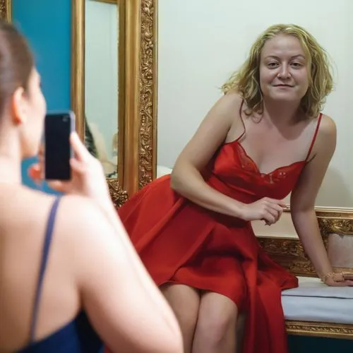 girl in red dress,in red dress,makeup mirror,red dress,the mirror,red gown,applying make-up,man in red dress,in the mirror,mirror,lady in red,magic mirror,a girl in a dress,doll looking in mirror,mirror reflection,bride getting dressed,mirror image,mirror frame,portrait photographers,the girl's face