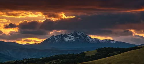 A sunset. It's a mountain top. Clouds around everywhere. Sun sets slowly. 10 second video. 4k. High quality. Wide frame. ,teton,grand teton,bernese alps,landscape mountains alps,southeast switzerland,