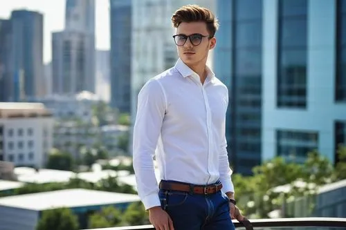 Male, young adult, 20-25 years old, bachelor's degree, interior designer, trendy hairstyle, black framed glasses, white shirt, dark blue jeans, brown leather shoes, holding a design portfolio, standin