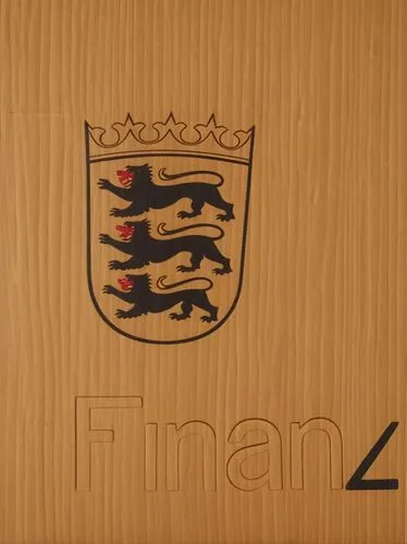 straightened heraldic logo: tax office coat of arms with the three black heraldic lions with red tongues on a yellow background and a heraldic crown above.,the wooden plaque has two lions on it,englis