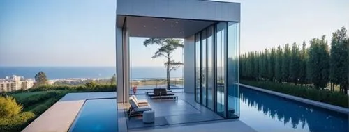 اشجار جماليه متنوعه و حوض سباحه وطقس مشمس واضاءه ملفته,amanresorts,penthouses,glass wall,dunes house,luxury property,landscape design sydney,mirror house,modern architecture,house by the water,infinit