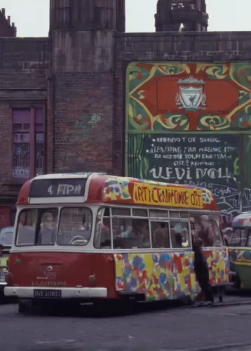 Describe the vibrant culture of Liverpool in the 1960s.,volkswagenbus,trolley bus,trolleybuses,ice cream van,hippy market,advert,liverpool,dennis dart,red bus,wenceslas square,13 august 1961,double-de