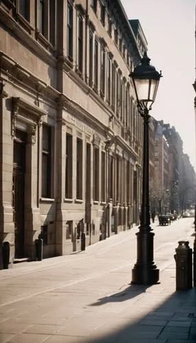 Brownstone buildings, neoclassical architecture, grand columned facade, ornate details, Aldo Rossi style, urban cityscape, busy streets, modern skyscrapers in background, vintage street lamps, pedestr