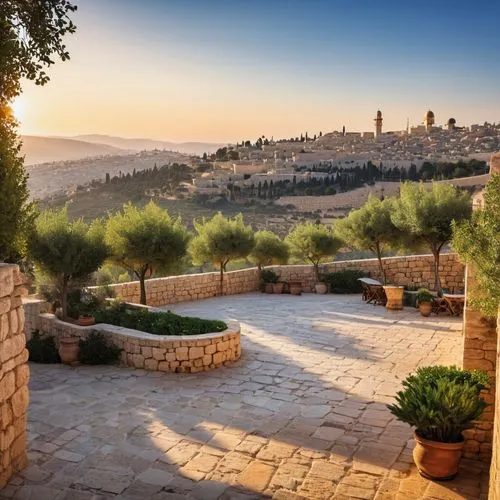 A Jerusalem courtyard overlooking the Jerusalem mountains at sunrise

,a very scenic view of the town from an old building,pienza,assisi,tuscan,monastery israel,genesis land in jerusalem,jerash