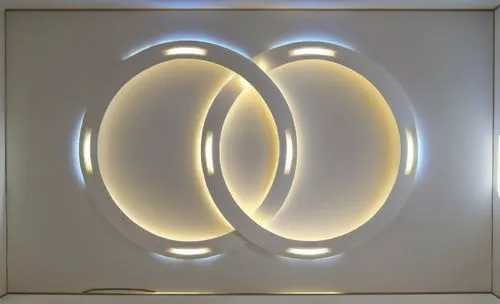 
Gypsum decoration in the ceiling of a room with hidden LED lighting,a white wall with three circular lights in front of it,light sign,foscarini,penannular,eero,wall light,orb,Photography,General,Real