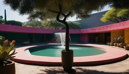 Luis Barragan's architectural style, colorful Mexican modernism, vibrant hues, geometric shapes, bold lines, monumental scale, dramatic light and shadow play, luxurious textures, brutalist concrete, w