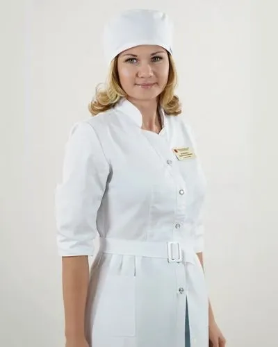 Медсестра в медицинском белом халате В Полный Рост.,the young woman is posing for a picture in her uniform,kutuzova,kolinda,female nurse,nurse,chef hat,chef