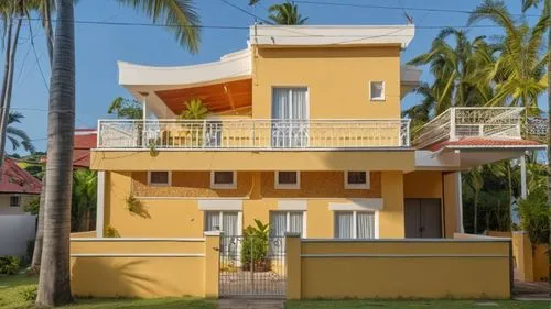 an orange house with some palm trees and a white roof,puram,padmanabhapuram,parvathipuram,varkala,srikalahasti,palayamkottai,Photography,General,Realistic