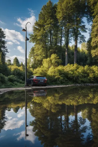 ,buidling, no humans, scenery, tree, outdoors, nature, ground vehicle, forest, water, building, reflection, lamppost, motor vehicle, sky,reflections in water,reflection in water,reflections,lakeside,m