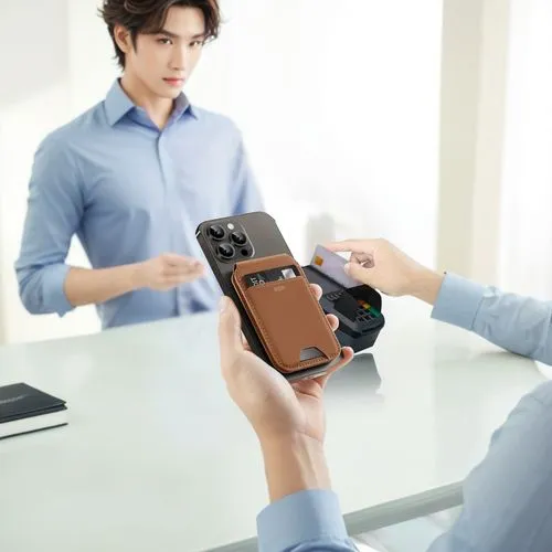 Men pay,a man that is standing up holding a smart phone,bluetooth headset,dji spark,photo camera,hanwha,kyocera,wireless headset