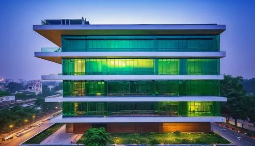 Modern architectural design firm, Chandigarh city, India, sleek glass façade, steel structure, minimalist interior, wooden accents, ergonomic chairs, futuristic desk lamps, green walls, abstract artwo