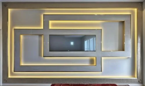 gypsum decoration in the ceiling of a room with hidden LED lighting,a room with a chair and a table,gold stucco frame,art deco frame,stucco frame,gold frame,mirror frame,gold wall,Photography,General,