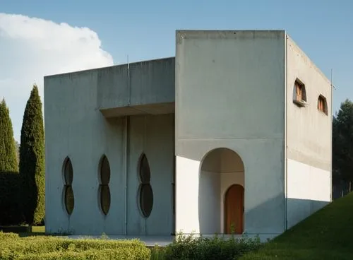 the front facade of a modern building with arched windows and a door in a corner,mausolea,masseria,aquileia,goetheanum,bramante,mausoleum,Photography,General,Realistic