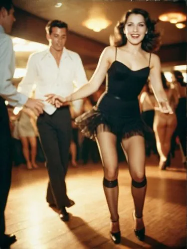 Grand beauty on the dance floor. Her lover behind.,a beautiful woman in a short dress and stockings dancing,milonga,bailar,tango argentino,danceteria,rumba,argentinian tango,Photography,Documentary Ph