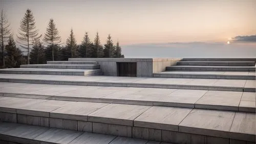 è una scalinata con un buco, tutta in cemento,holocaust memorial,concrete blocks,concrete slabs,concrete,concrete construction,amphitheater,3d rendering,exposed concrete,roof landscape,elphi,archidail