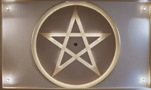 Gypsum decoration in the ceiling of a room with hidden LED lighting the ceiling,a small golden pentagram in the center of a wall,christ star,eckankar,circular star shield,star of david,tetragrammaton,