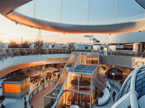 REMODELACION DE UNA PLAZA COMERCIAL, CON ARQUITECTURA NOVEDOSA,the inside of a building with several floors and balconies,yacht exterior,on a yacht,seabourn,cruises,cruise ship,fincantieri,Photography