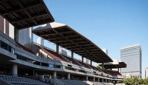 Grandstand seating, curved cantilevered roofs, exposed steel beams, industrial-style lighting, concrete brutalist architecture, geometric patterned facades, dynamic angular lines, monumental scale, ur