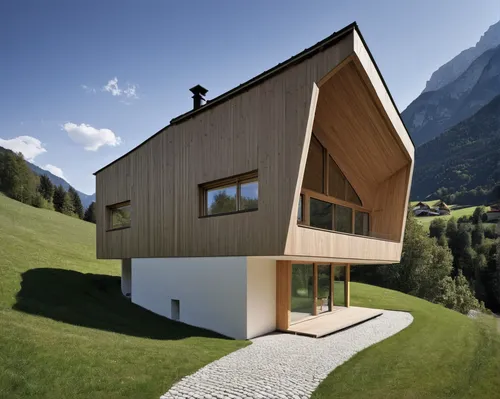 House in Bludenz by Architekten Innauer Matt,swiss house,house in mountains,house in the mountains,mountain hut,chalet,timber house,irisch cob,alpine style,wooden house,alpine dachsbracke,cubic house,