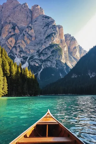 The view of Lago di Braies from our boat. Not pictured: Daniel and I trying to convince the other to row.,lake misurina,lake moraine,moraine lake,boat landscape,canoeing,emerald lake,maligne lake,lake