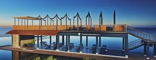 the dock has chairs under them and there is an ocean view,stilt house,cube stilt houses,stilt houses,floating huts,amanresorts,penthouses,holiday villa,pool house,anantara,landscape design sydney,dune