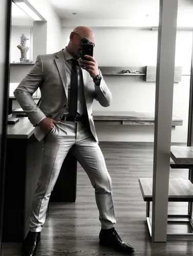 Bald man, 48 years old, with Italian mustache, slanted blue eyes, dressed in an elegant beige suit and white shirt.. Style: cinematic, realistic, cyberpunk. a color,wedding suit,men's suit,suit,suit t