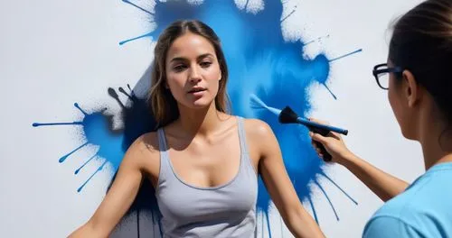 Woman  is spray painted art.,a woman standing in front of a building with a graffitti on it,blue painting,airbrushing,bodypainting,painting technique,body painting,rotoscoped