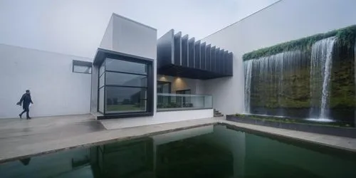 aqua studio,cubic house,cube house,water wall,modern house,modern architecture