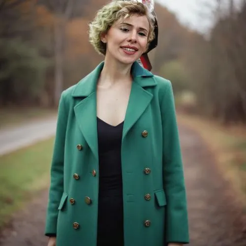 short and petite woman, green coat, short wavy hair,pantsuit,bolero jacket,green jacket,irish soft-coated wheaten terrier,green dress,woman in menswear,in green,greta oto,female doctor,pixie-bob,polit