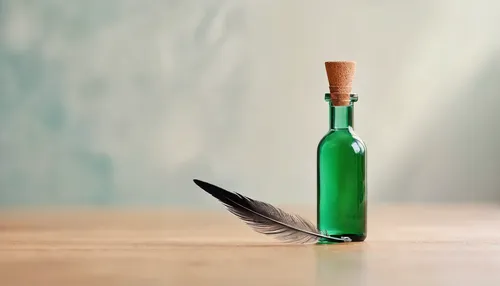 Set up a minimalist still life scene with a glass bottle and a single feather.,feather pen,message in a bottle,feather on water,isolated bottle,peacock feather,drift bottle,writing instrument accessor