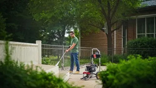 dad and son outside,mobility scooter,walk-behind mower,motorized scooter,lawn mower robot,scooter riding,electric scooter,scooters,boy and dog,dog walker,mowing the grass,training wheels,stroller,kick scooter,e-scooter,scooter,father with child,mowing,street cleaning,longboarding