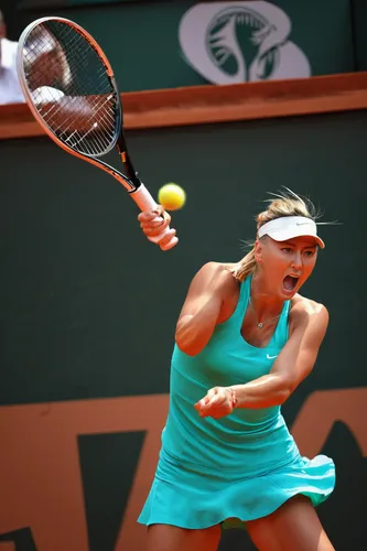 Maria Sharapova goes full-extension for this backhand lob during the semifinals of the 2012 French Open at Roland Garros. She went on to claim her first French Open title, which was the last of the fo