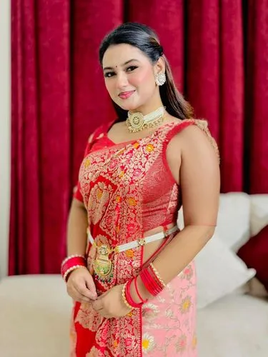 a woman in a red dress posing for the camera,kebaya,kartini,rachmawati,sukarnoputri,indian bride,suciwati