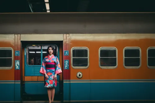 the girl at the station,travel woman,japanese woman,train of thought,last train,electric train,railway carriage,train,red heart on railway,train compartment,long-distance train,international trains,pa