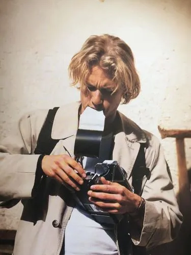 mcdormand,dormand,blonde woman reading a newspaper,kieslowski,woman holding a smartphone,nedved,goldfrapp,the blonde photographer,jarmusch,cobain,rampling,garrel,beckett,sylvian,antonioni,dutronc,kusturica,photodeluxe,cassavetes,segall