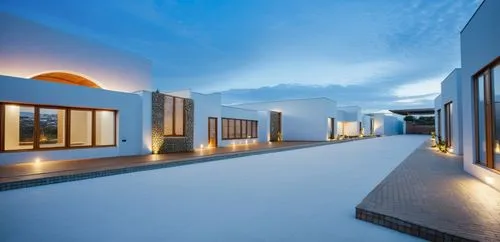 Leve movimiento arquitectónico con luz natural respetando la forma y texturas  
,the outside of a modern home at night,amanresorts,roof landscape,holiday villa,dunes house,luxury property,penthouses,P