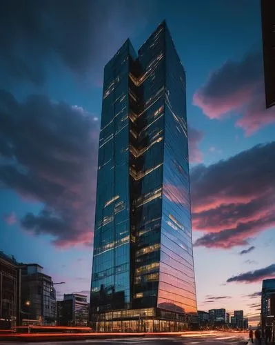 Modern futuristic skyscraper, sleek metallic materials, glass facade, reflective windows, angular structure, neon lights illuminating the exterior, cityscape at dusk, towering above surrounding buildi