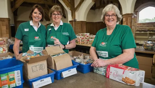 "© Licensed to London News Pictures.  30/05/2013. LITTLE CHALFONT, UK. Volunteers Clare Callaghan (L) and Gill Seymour (R) staff a food bank in St George's Church in Little Chalfont. Despite being one