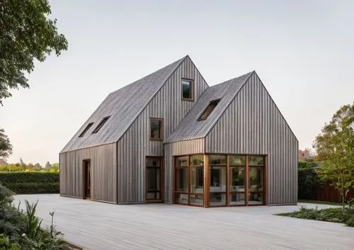 gray window frames only,timber house,danish house,wooden house,inverted cottage,frisian house,metal cladding,dunes house,house shape,wooden planks,wooden decking,folding roof,frame house,house heveliu