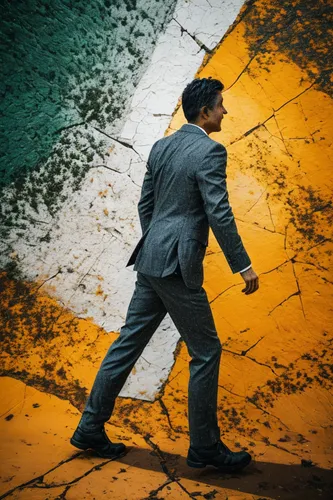 A man walks steadily and confidently,pedestrian,a pedestrian,walking man,man with umbrella,street photography,people walking,crosswalk,woman walking,white-collar worker,standing man,abstract corporate