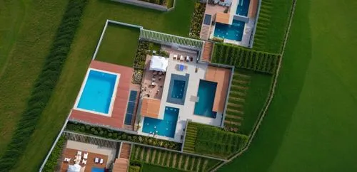 the house is on top of a hill with many trees around it,golf resort,golf hotel,golf lawn,artificial grass,outdoor pool,infinity swimming pool,Photography,General,Realistic