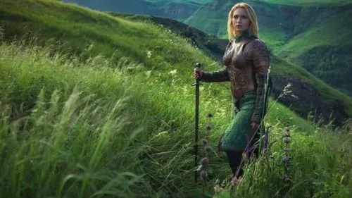 the girl is dressed in green with a backpack,swath,shannara,elvish,kahlan,morgause,wiglaf